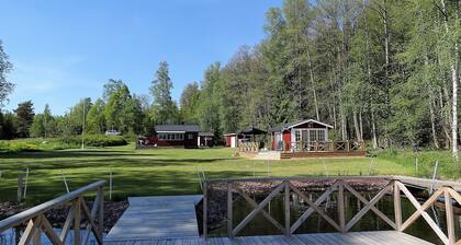 Cottage on lake plot with own dock, boat and sauna