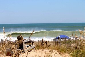 On the beach, sun loungers, beach towels
