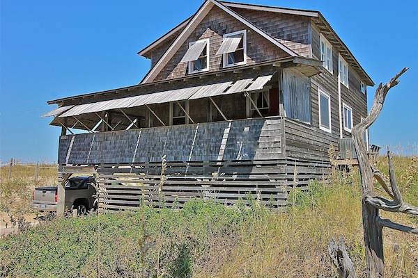 Southwest Elevation showing vacant land to the North creating amazing views.