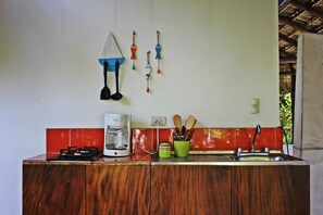 Fridge, stovetop, coffee/tea maker, cookware/dishes/utensils
