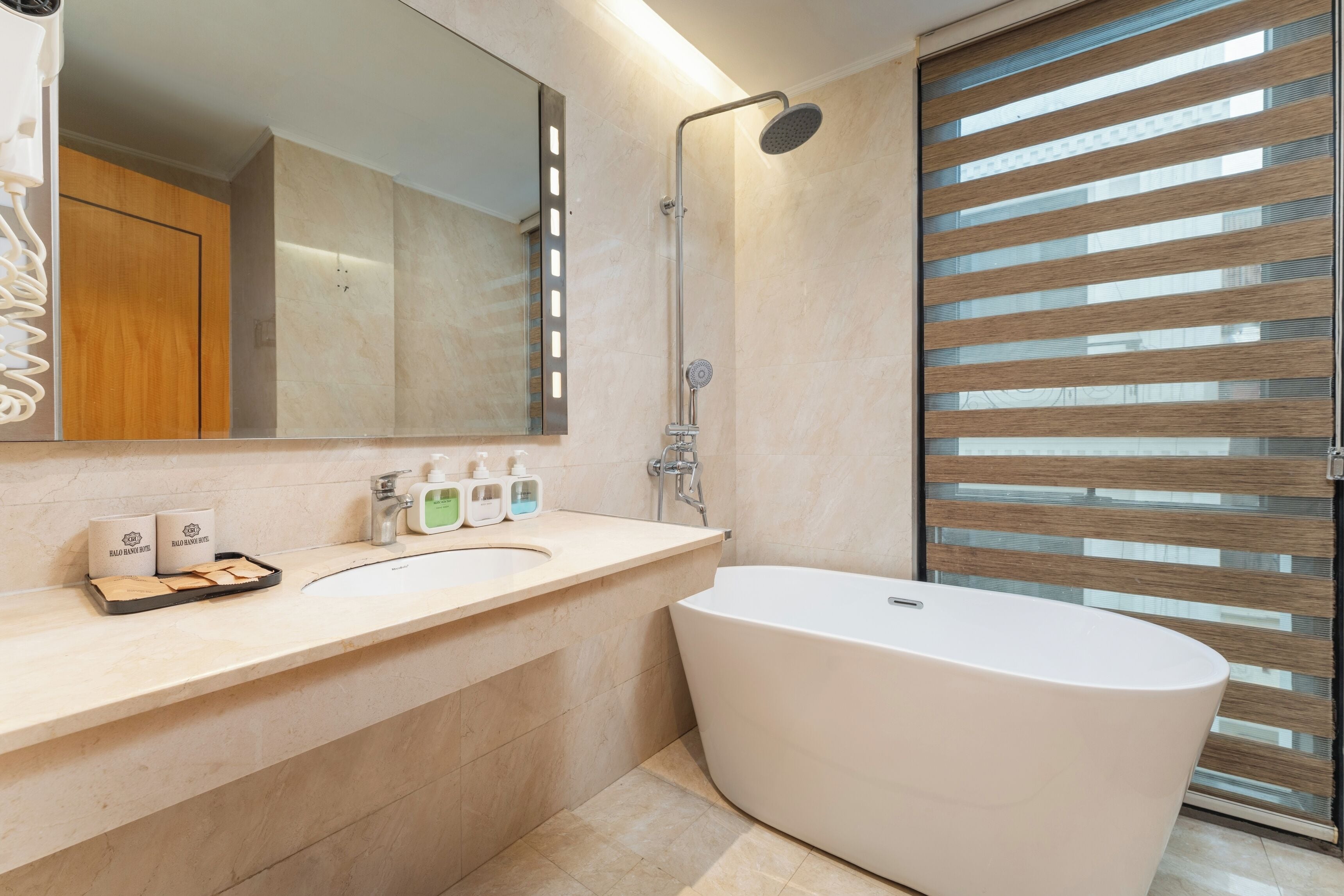 Luxury Double Room, 1 Bedroom, Courtyard View | Bathroom | Shower, rainfall showerhead, free toiletries, bathrobes