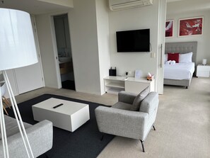 Apartamento | Área de estar | TV de tela plana