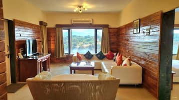 2 BHK Penthouse with 3 Terrace | Living area | 43-inch LCD TV with satellite channels, TV