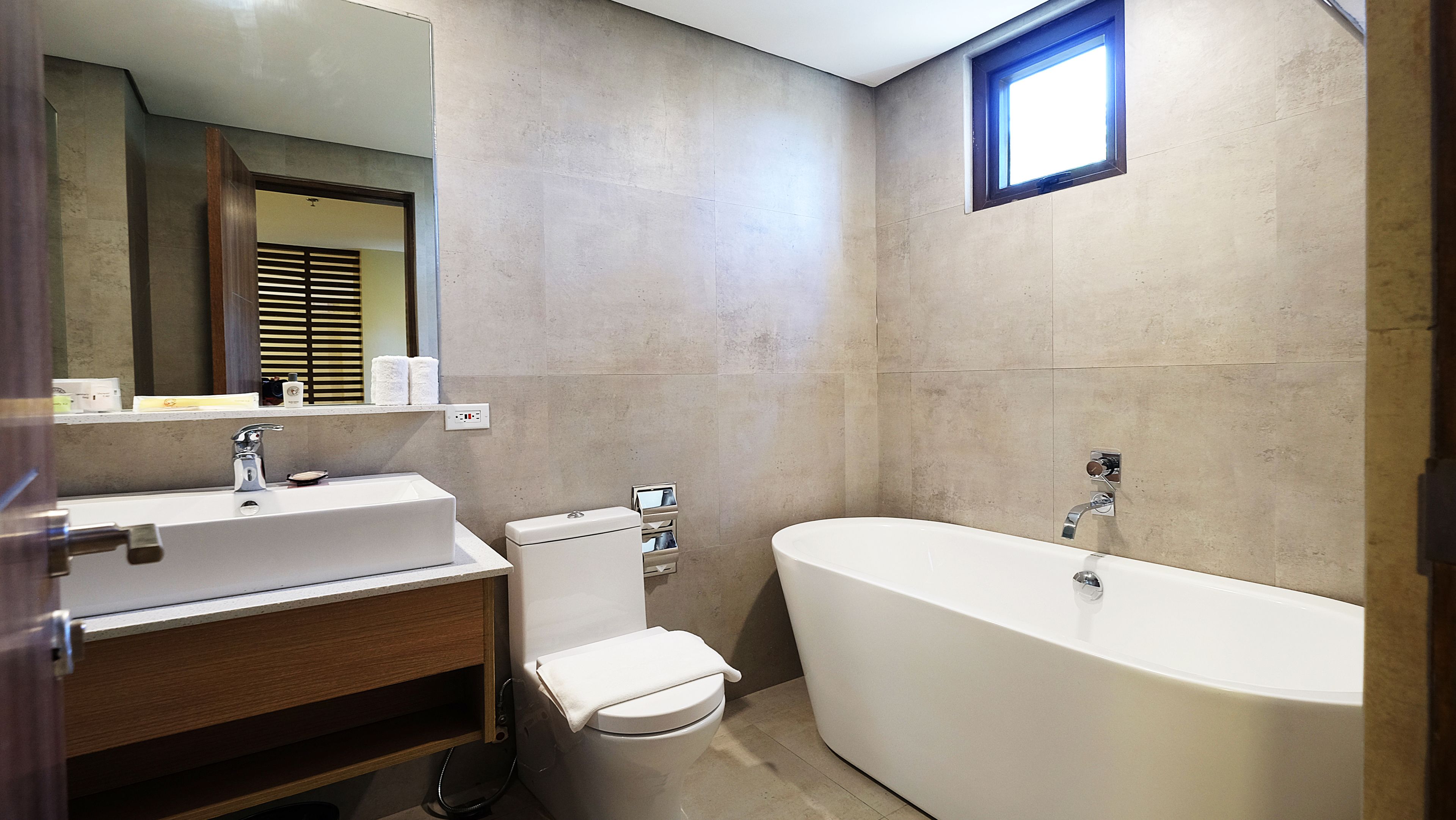premier suite | bathroom | free toiletries, hair dryer, slippers, bidet