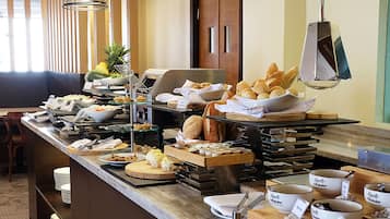Breakfast, lunch served; local and international cuisine, pool views