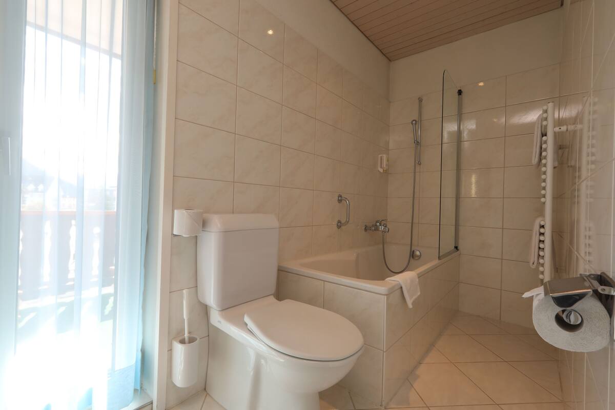 superior double room, balcony | bathroom | hair dryer, towels