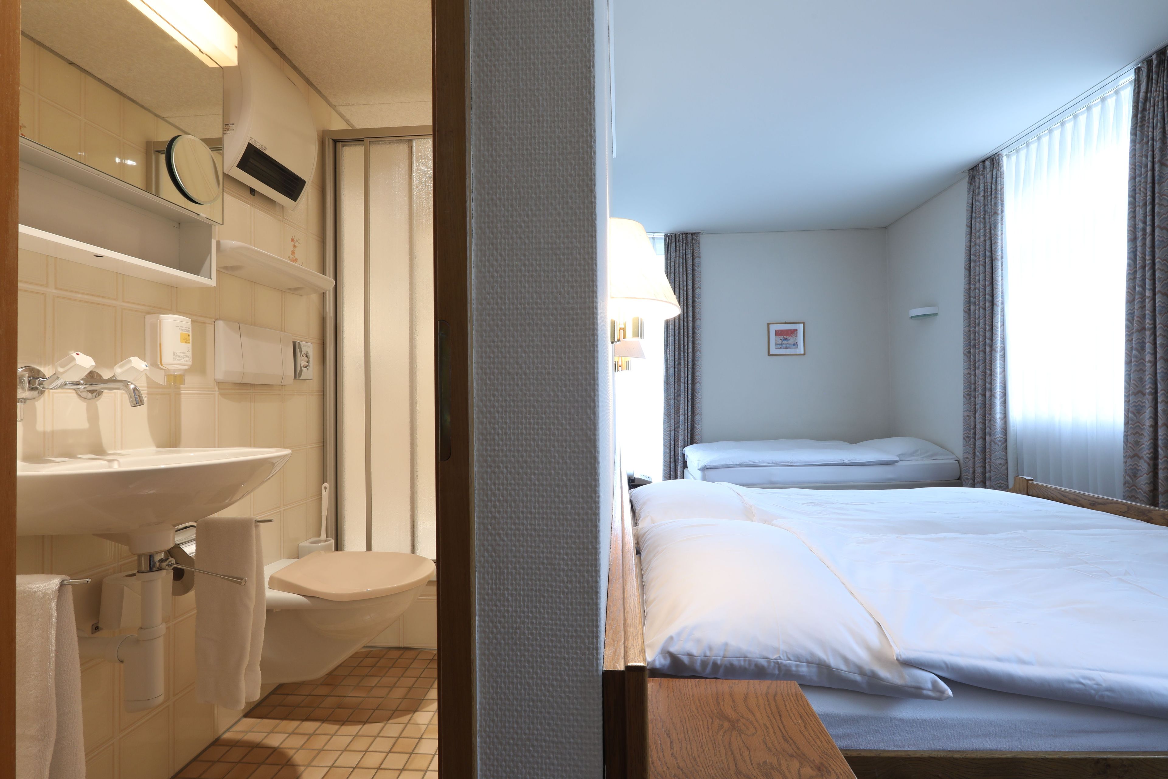 triple room | bathroom amenities | hair dryer, towels