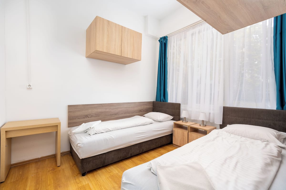 Twin Room, Private Bathroom | Free WiFi, bed sheets