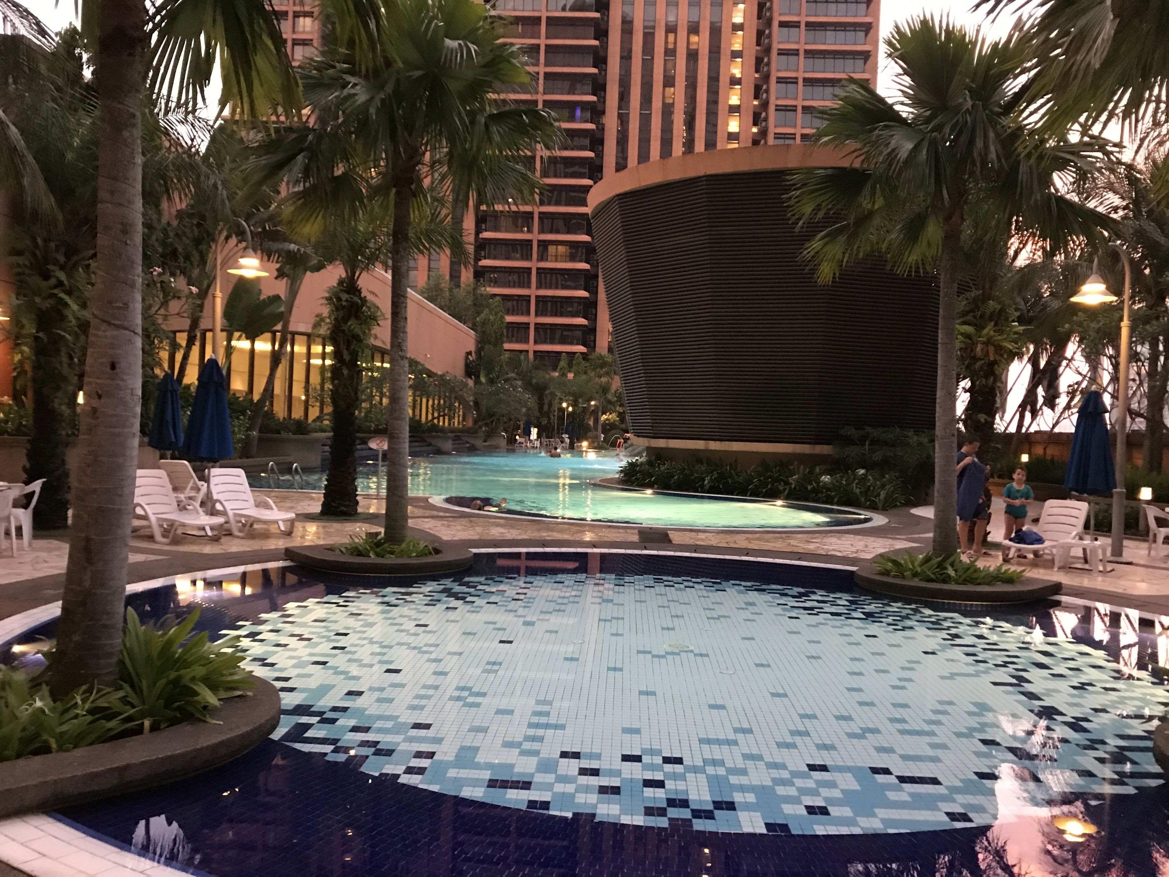 3 outdoor pools, open 7:00 AM to 10:00 PM, pool umbrellas