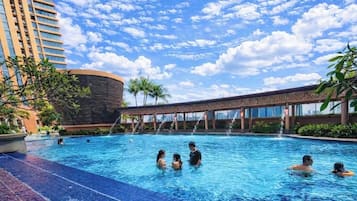 3 outdoor pools, open 7:00 AM to 10:00 PM, pool umbrellas