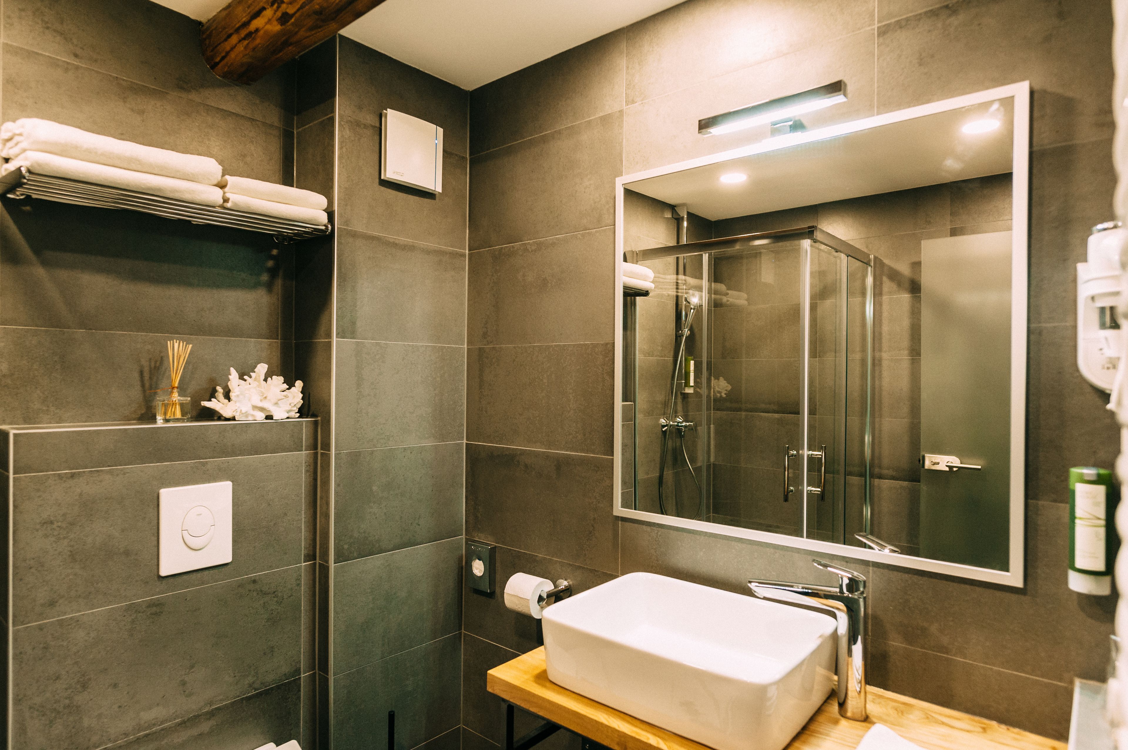 shower, free toiletries, hair dryer, towels