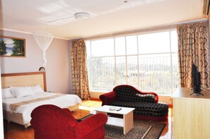 Chambre exécutive | Literie de qualité, minibar, coffre-fort, bureau