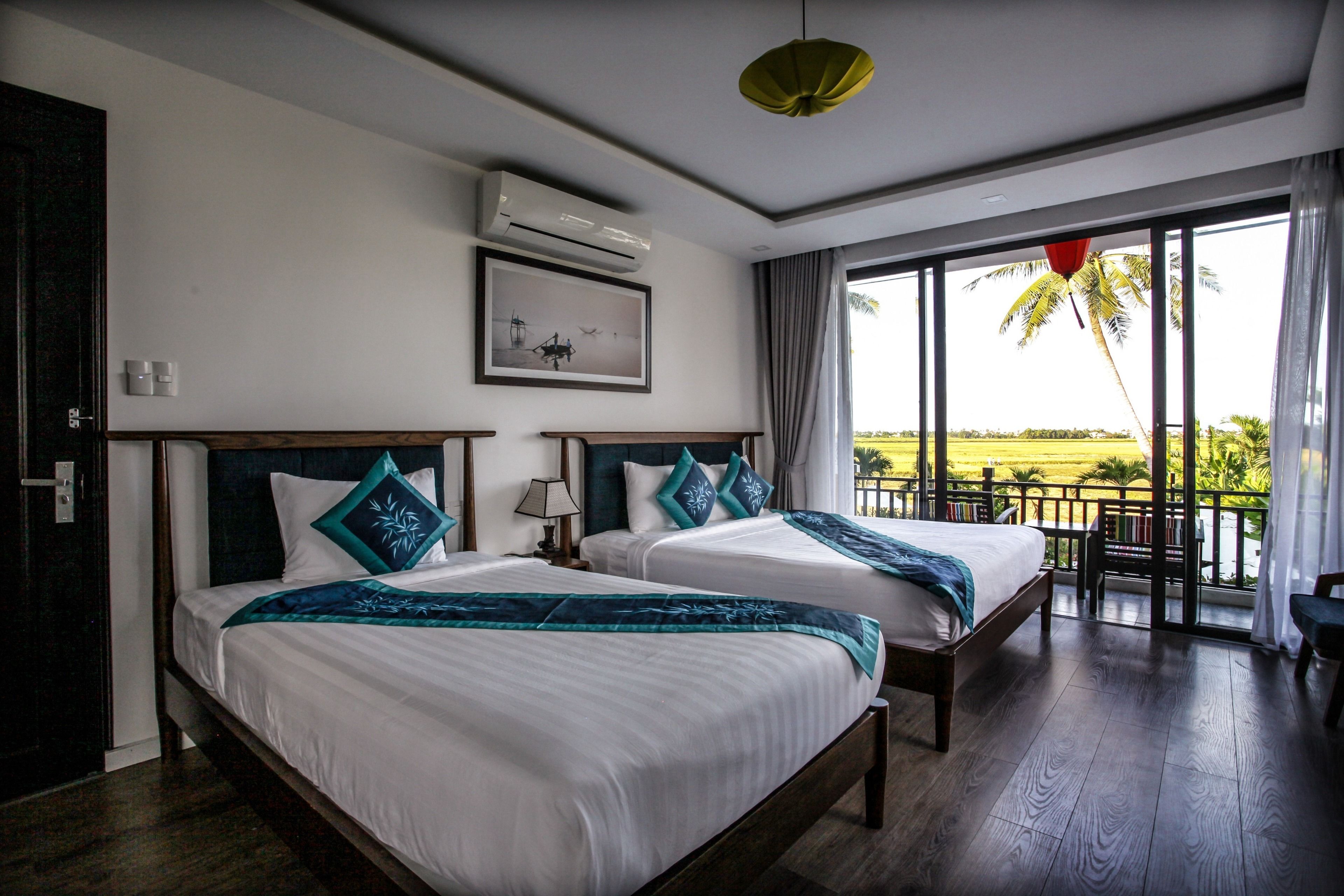 junior triple room | premium bedding, free minibar items, in-room safe, desk