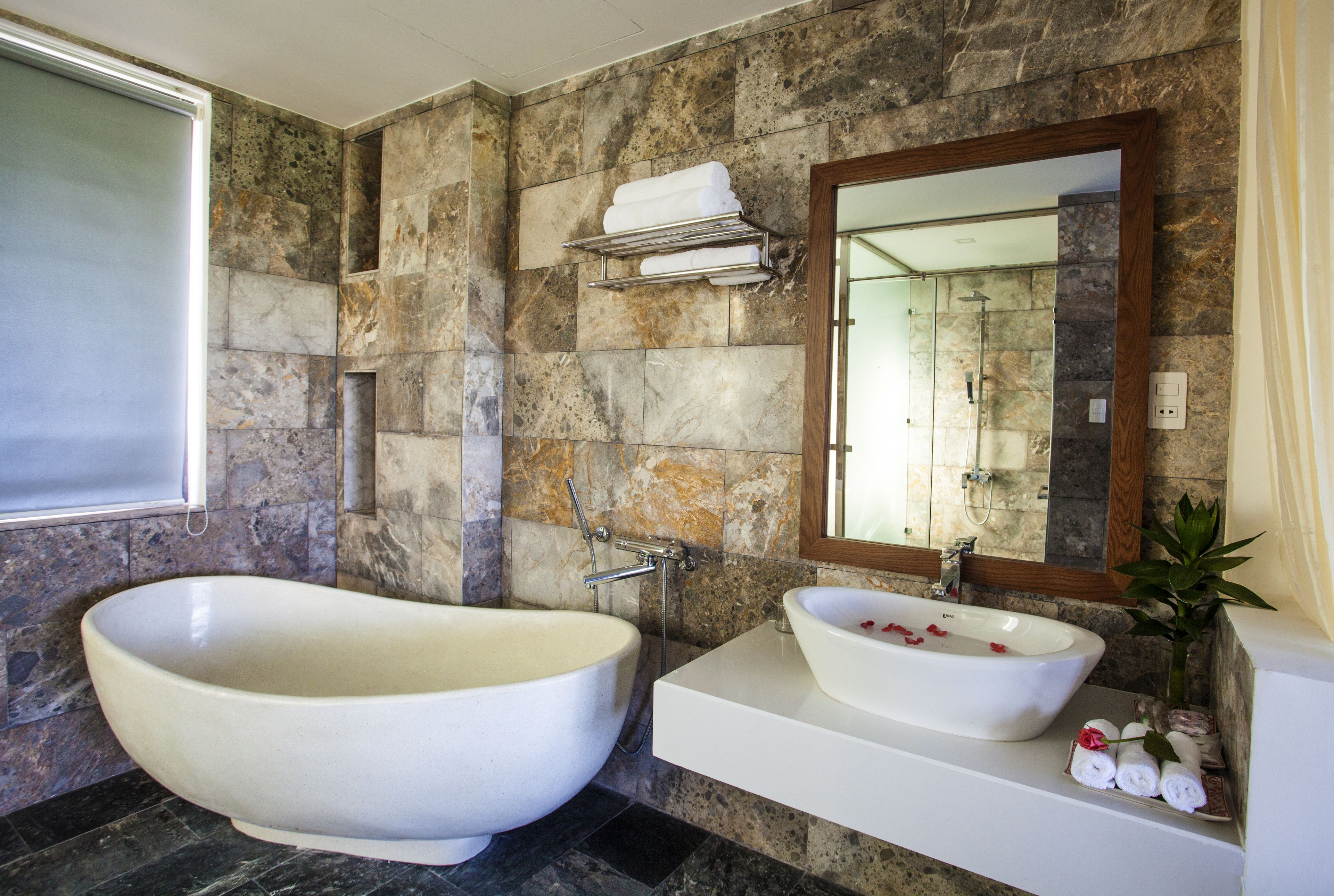 grand suite, connecting rooms | bathroom amenities | free toiletries, hair dryer, bathrobes, slippers