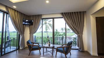 Habitación doble Deluxe, vista al jardín | Ropa de cama de alta calidad y artículos del minibar gratis