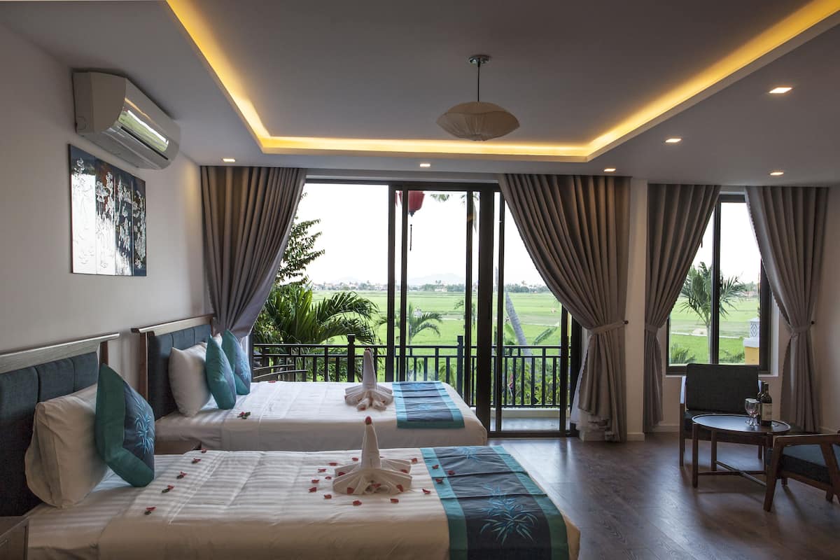 Junior Triple Room | Premium bedding, free minibar items, in-room safe, desk