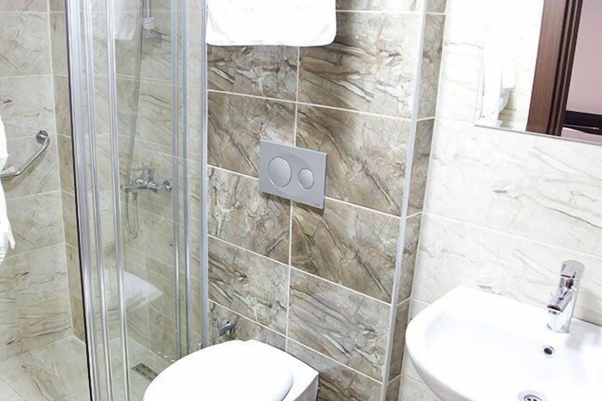 shower, free toiletries, hair dryer, slippers