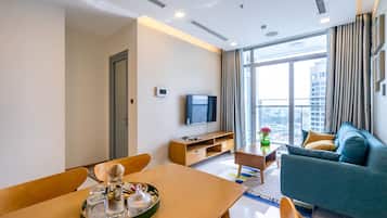 Two-Bedroom Apartment with Balcony and City View | Living room | 45-inch flat-screen TV with cable channels, TV