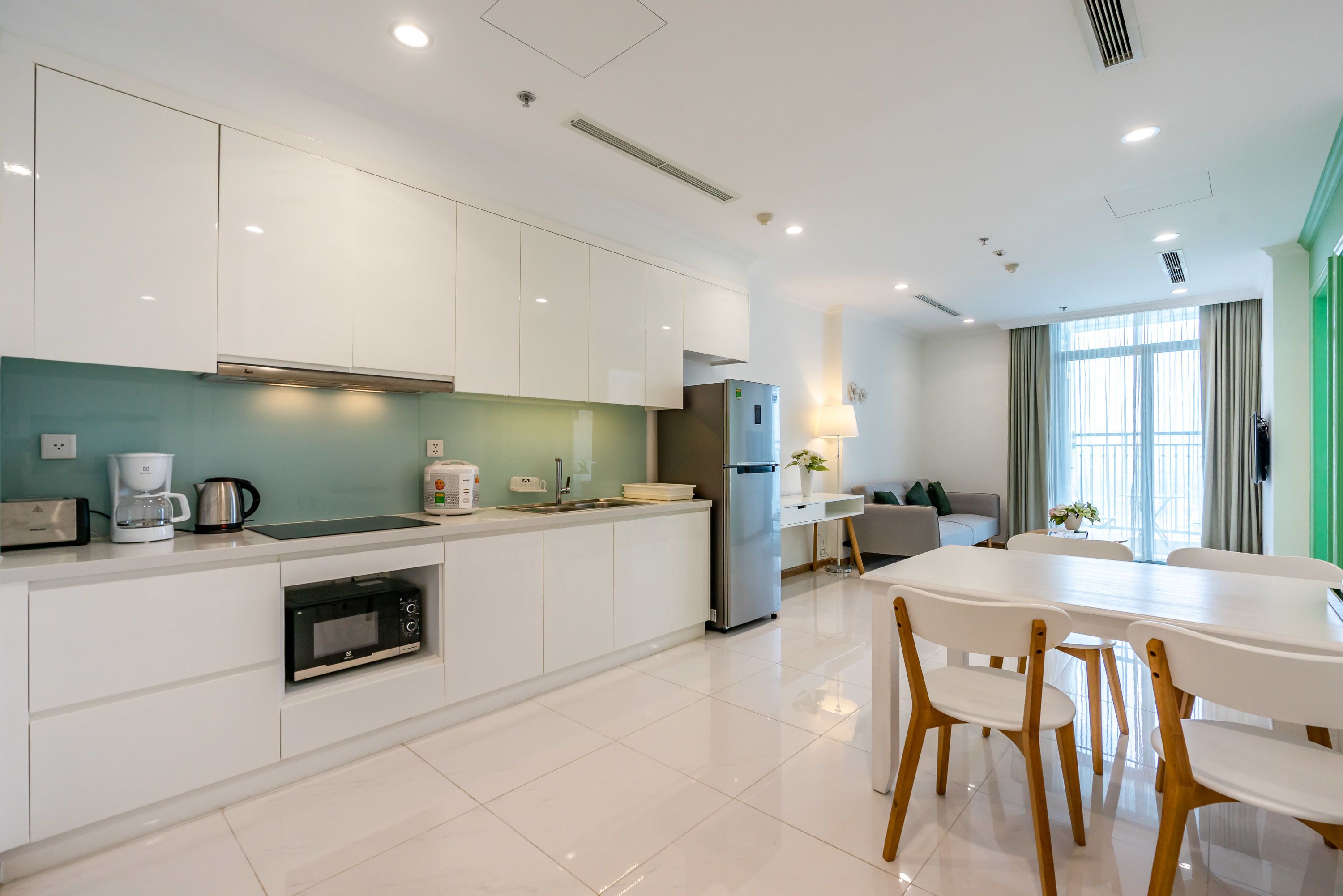 one-bedroom apartment with balcony and city view | private kitchen | fridge, microwave, stovetop, rice cooker