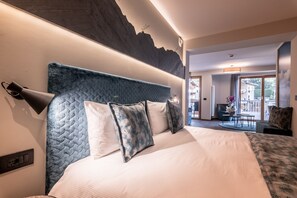 Design kamer, 1 twee- of 2 eenpersoonsbedden | Luxe beddengoed, donsdekens, een kluis op de kamer