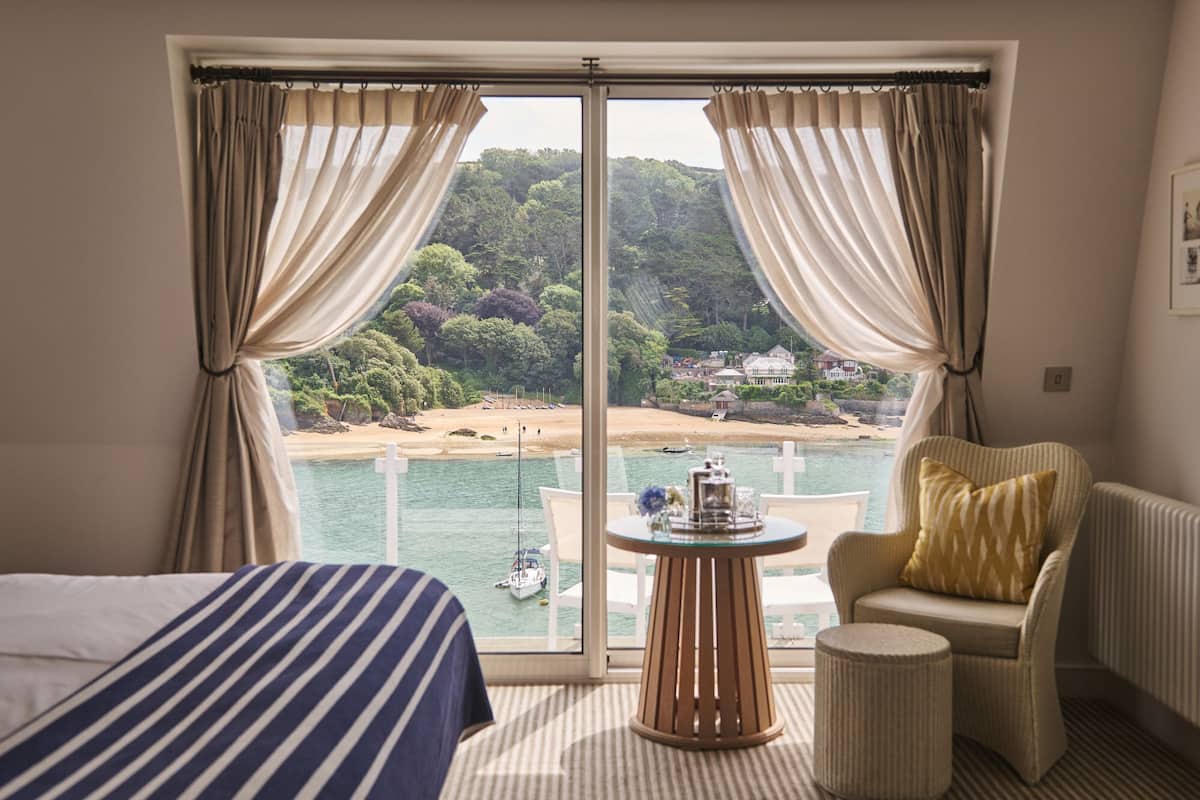 room, balcony (our best estuary view) | free minibar items, in-room safe, desk, laptop workspace