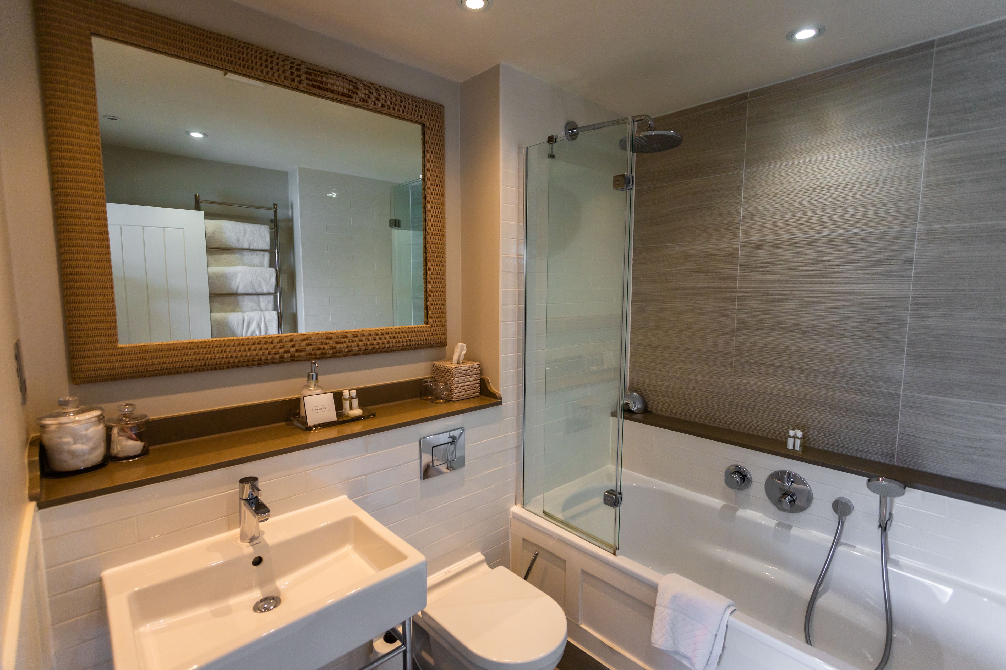 double room juliette balcony estuary glimpse | bathroom | designer toiletries, hair dryer, slippers, towels