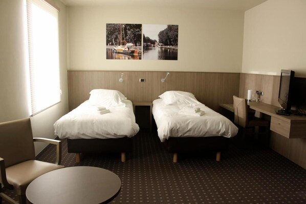 Premium bedding, in-room safe, desk, soundproofing