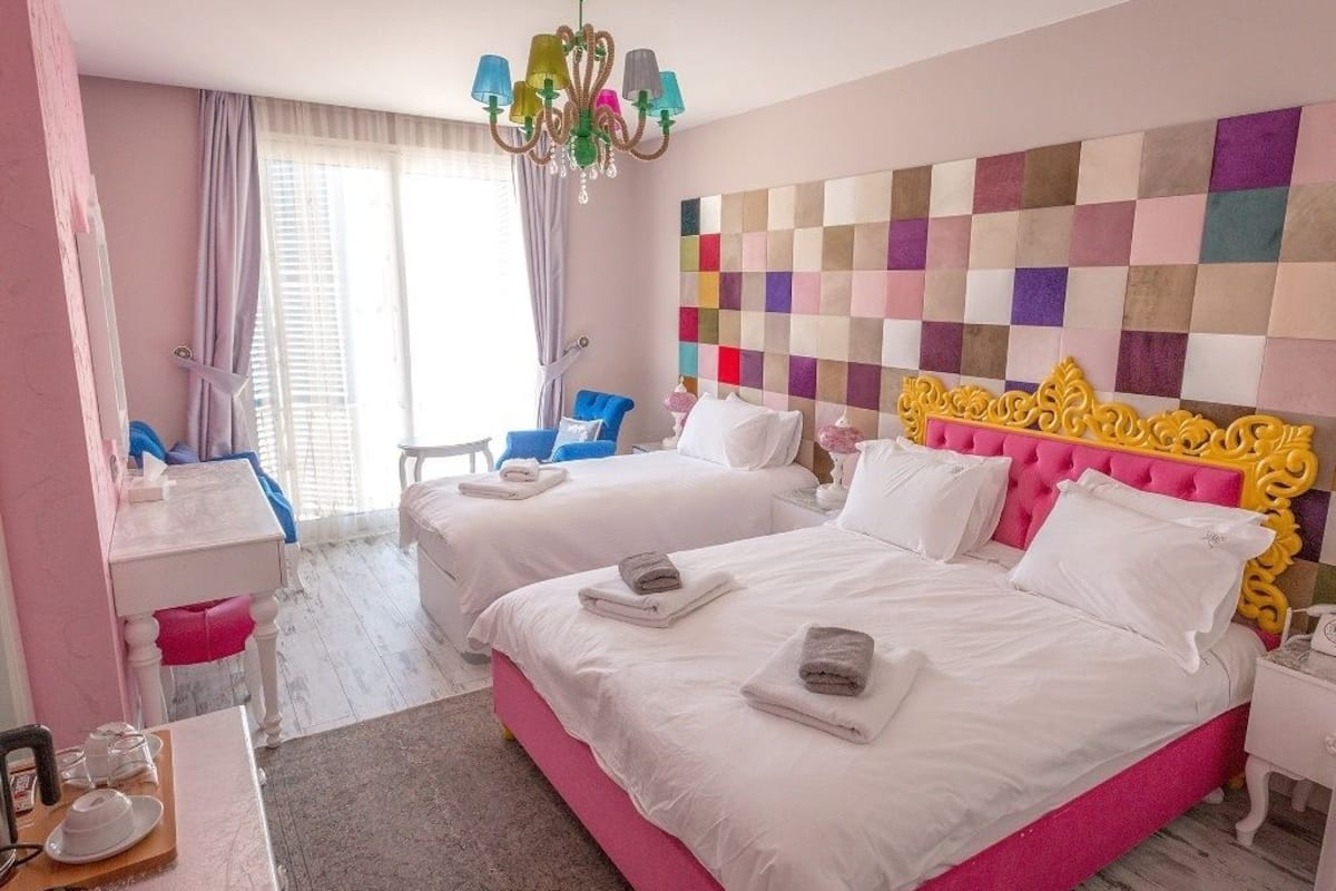 deluxe triple room | premium bedding, in-room safe, desk, soundproofing