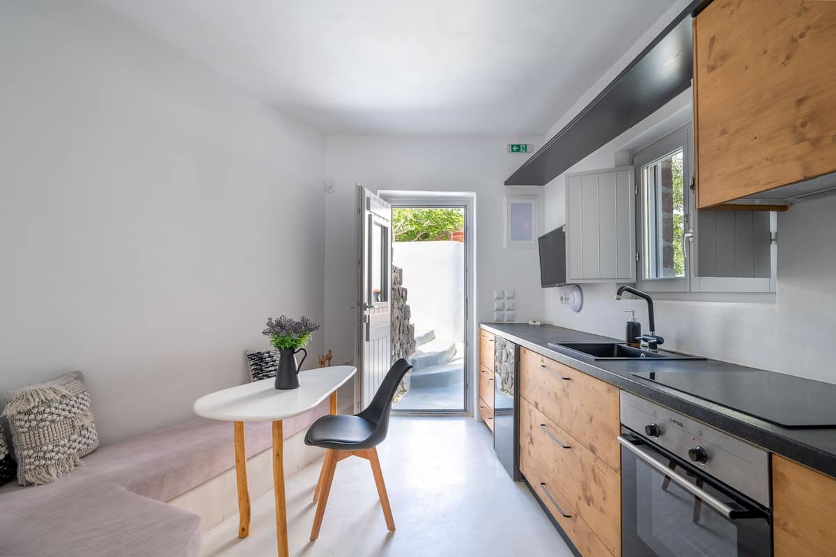 two bedroom sea view villa with hot tub - fourni | living area | 32-inch smart tv with satellite channels, tv