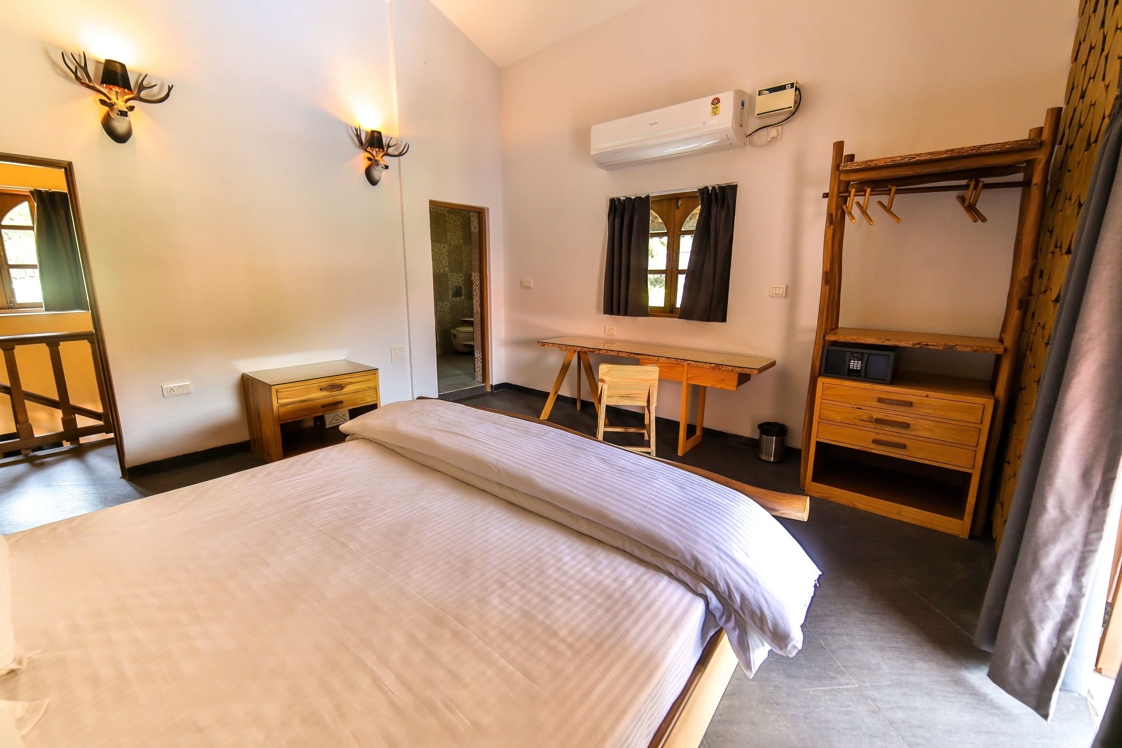 deluxe room, pool view | 1 bedroom, in-room safe, rollaway beds, free wifi
