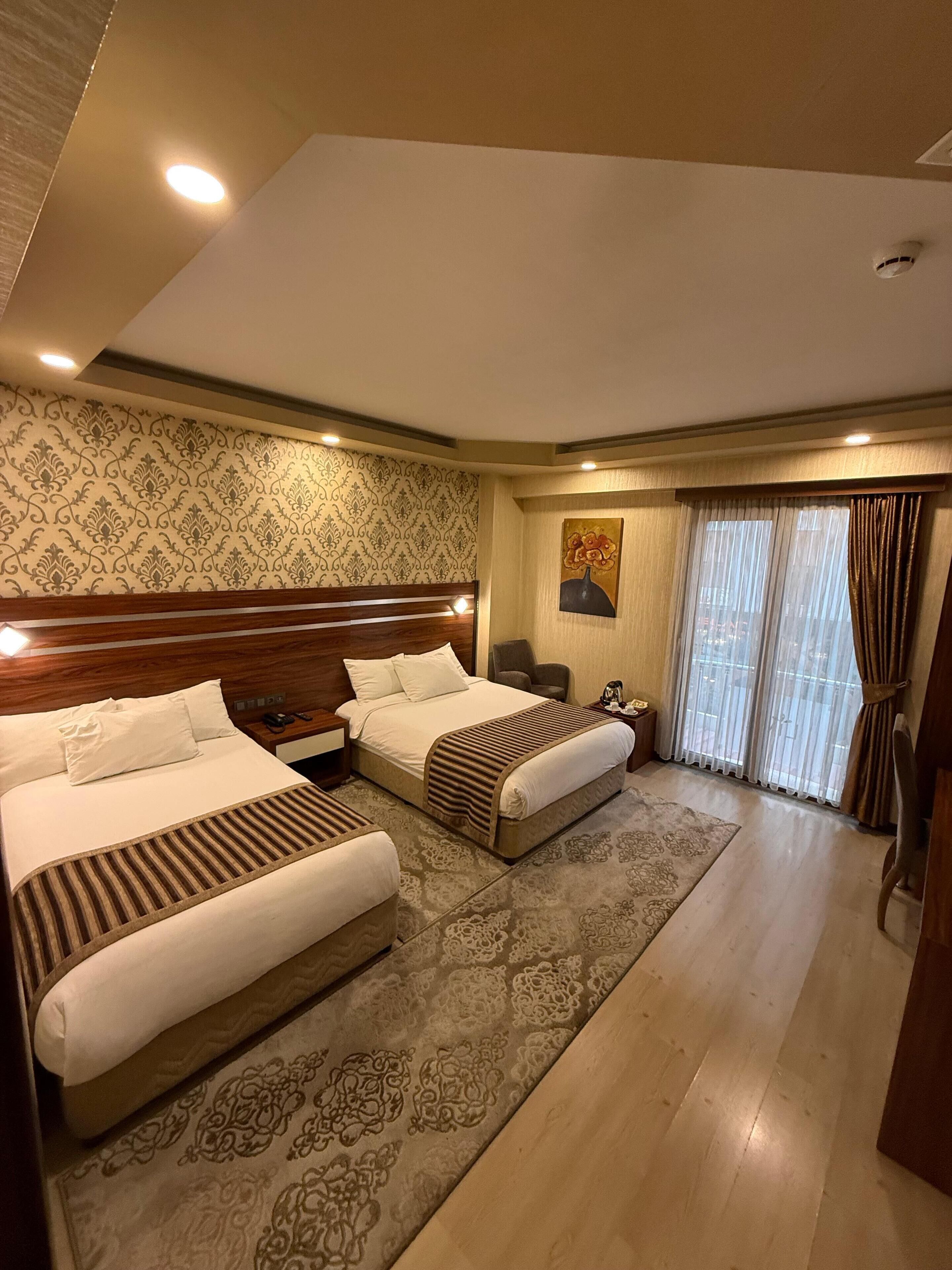 Triple Room | Premium bedding, minibar, in-room safe, desk