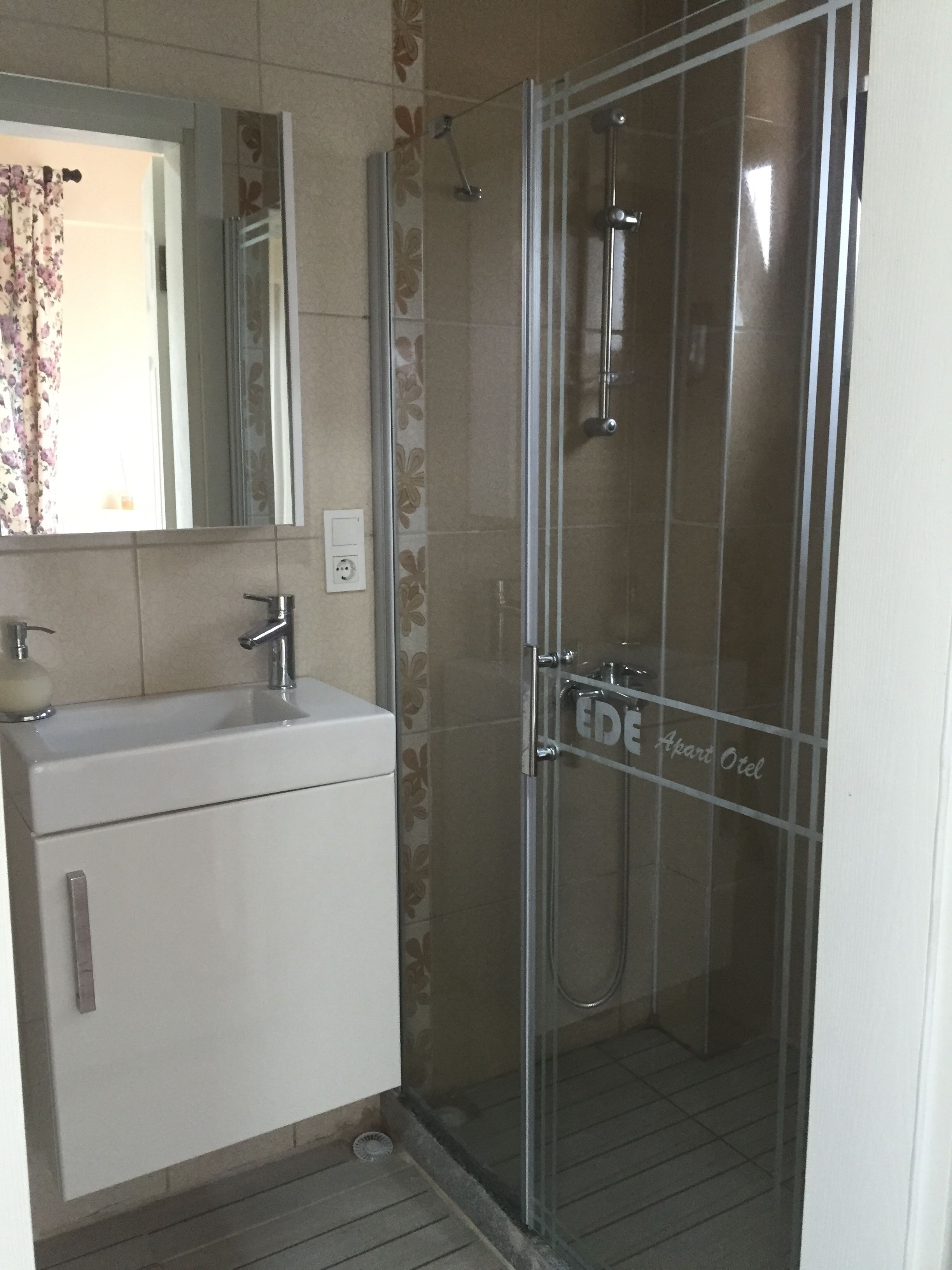 shower, free toiletries, hair dryer, slippers