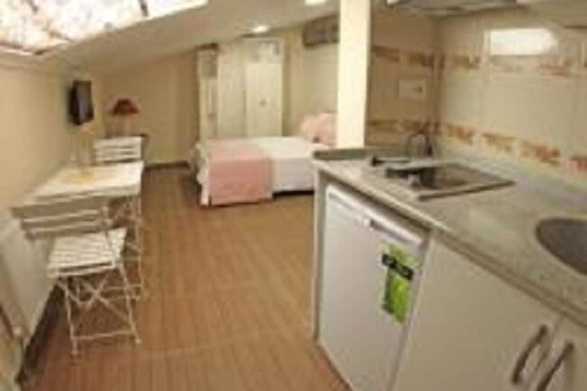 deluxe triple room, multiple beds, sea view | 1 bedroom, premium bedding, down duvets, select comfort beds