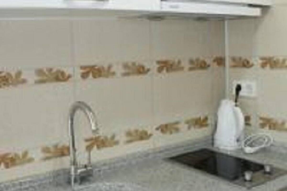 elite twin room, 2 single beds, accessible, garden view | private kitchen | fridge, stovetop, electric kettle, cookware/dishes/utensils