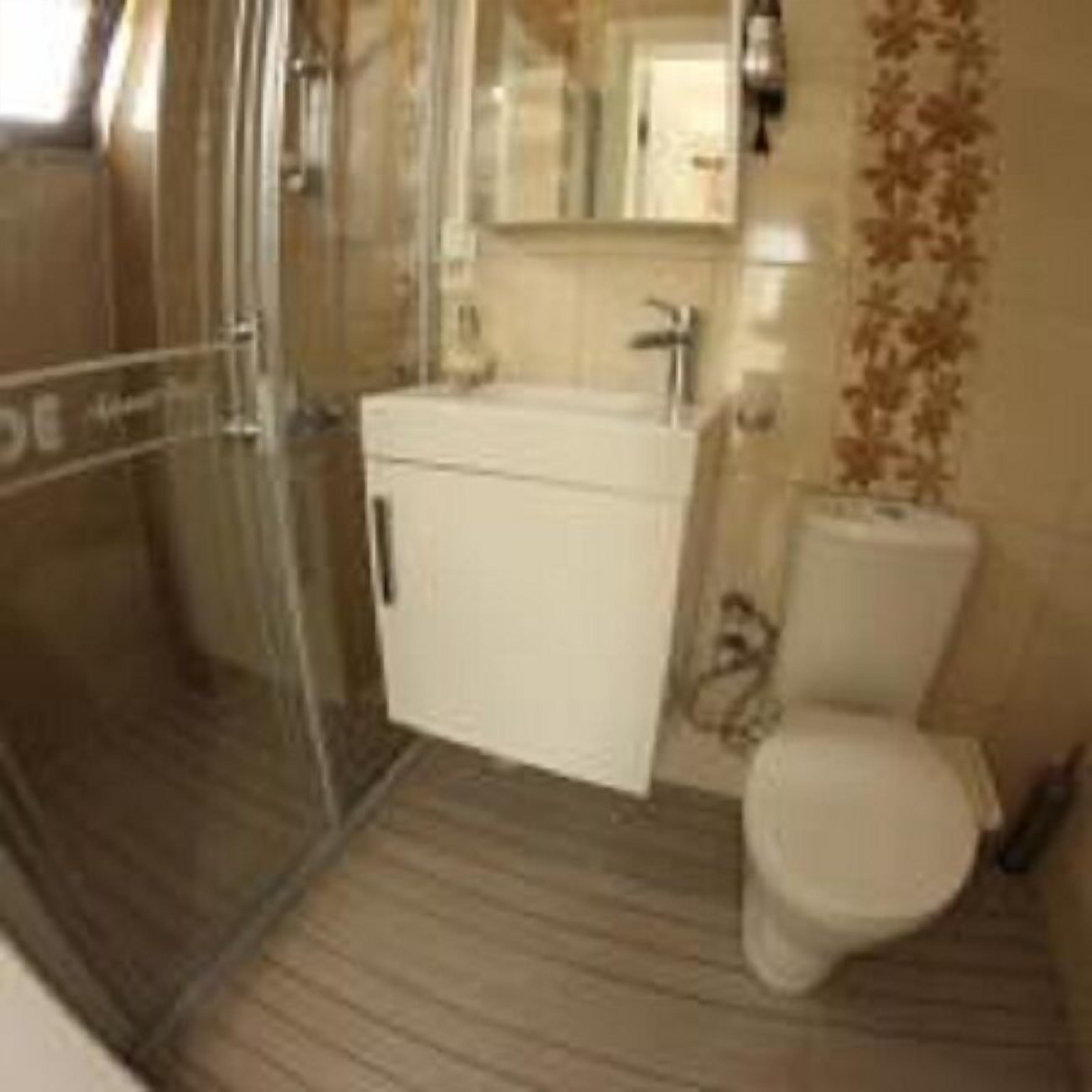 standard triple room, multiple beds, garden view | bathroom | shower, free toiletries, hair dryer, slippers