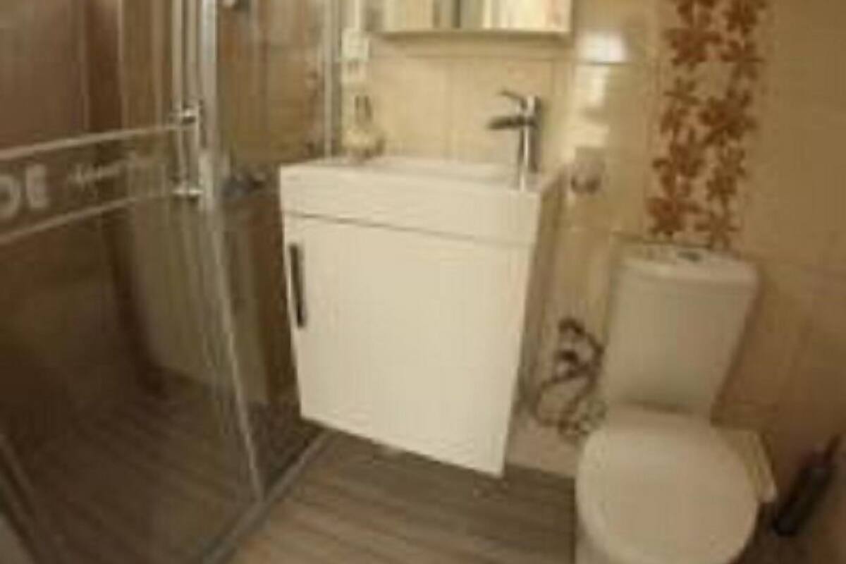 standard triple room, multiple beds, garden view | bathroom | shower, free toiletries, hair dryer, slippers