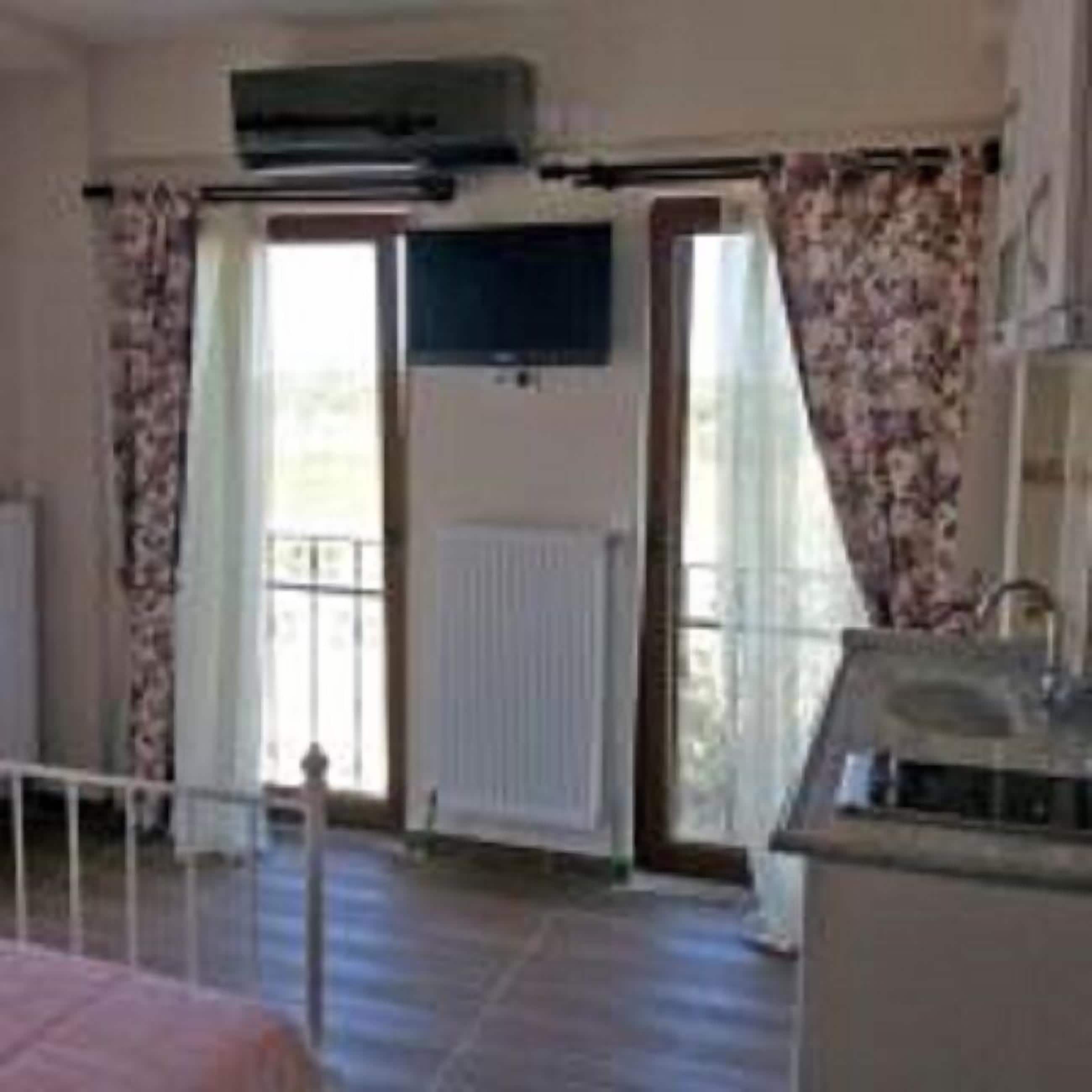 deluxe double room, 1 double bed, sea view | living area | 28-inch lcd tv with satellite channels, tv
