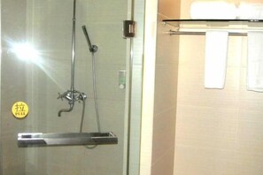 A glass-enclosed shower area with a pull handle, a towel rack with a white towel, and a visible "PULL" sign. - Golden Palace Hotel (Kunming)