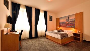 Standard Double Room | Living area | Flat-screen TV