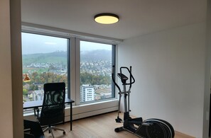 City Apartment | Living area | Flat-screen TV