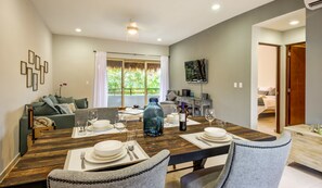 Penthouse, 1 King Bed, Kitchen, Pool View | Living area | Flat-screen TV