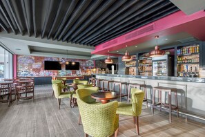 5 bars/lounges, poolside bar, beach bar