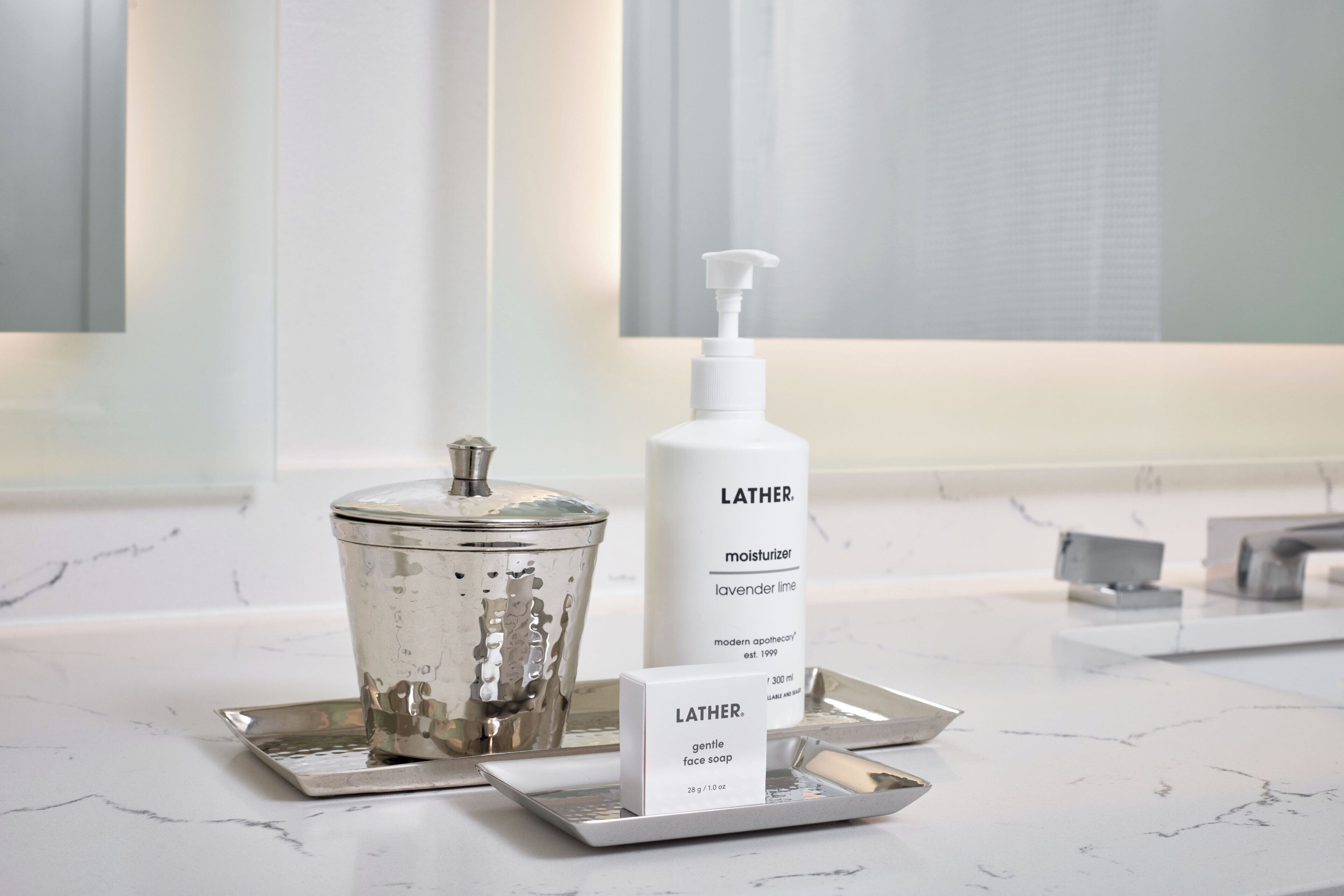 designer toiletries, hair dryer, bathrobes, slippers