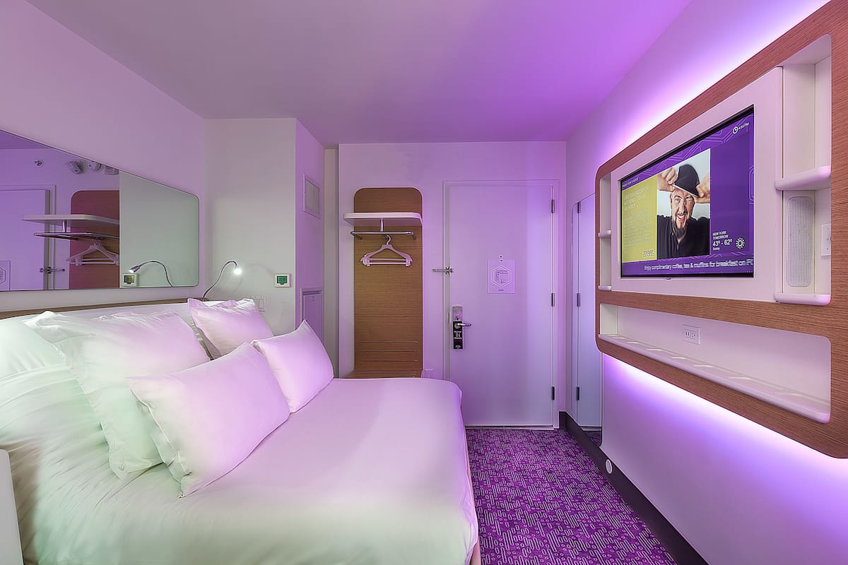 Hypo-allergenic bedding, in-room safe, laptop workspace