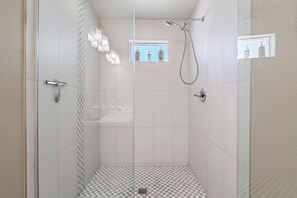 Combined shower/tub, hair dryer, towels, soap