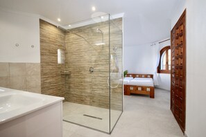 Bathtub, hair dryer, towels, soap
