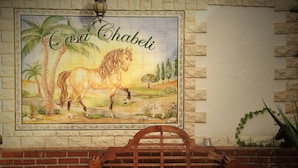 A tiled wall with a horse mural and the name "Casa Chabeli". - Mediterranean holiday house, Berlin Steglitz-Zehlendorf, 4 bedrooms, 11 persons (Berlin)