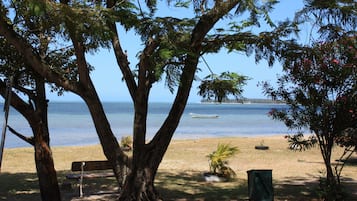 On the beach, sun-loungers