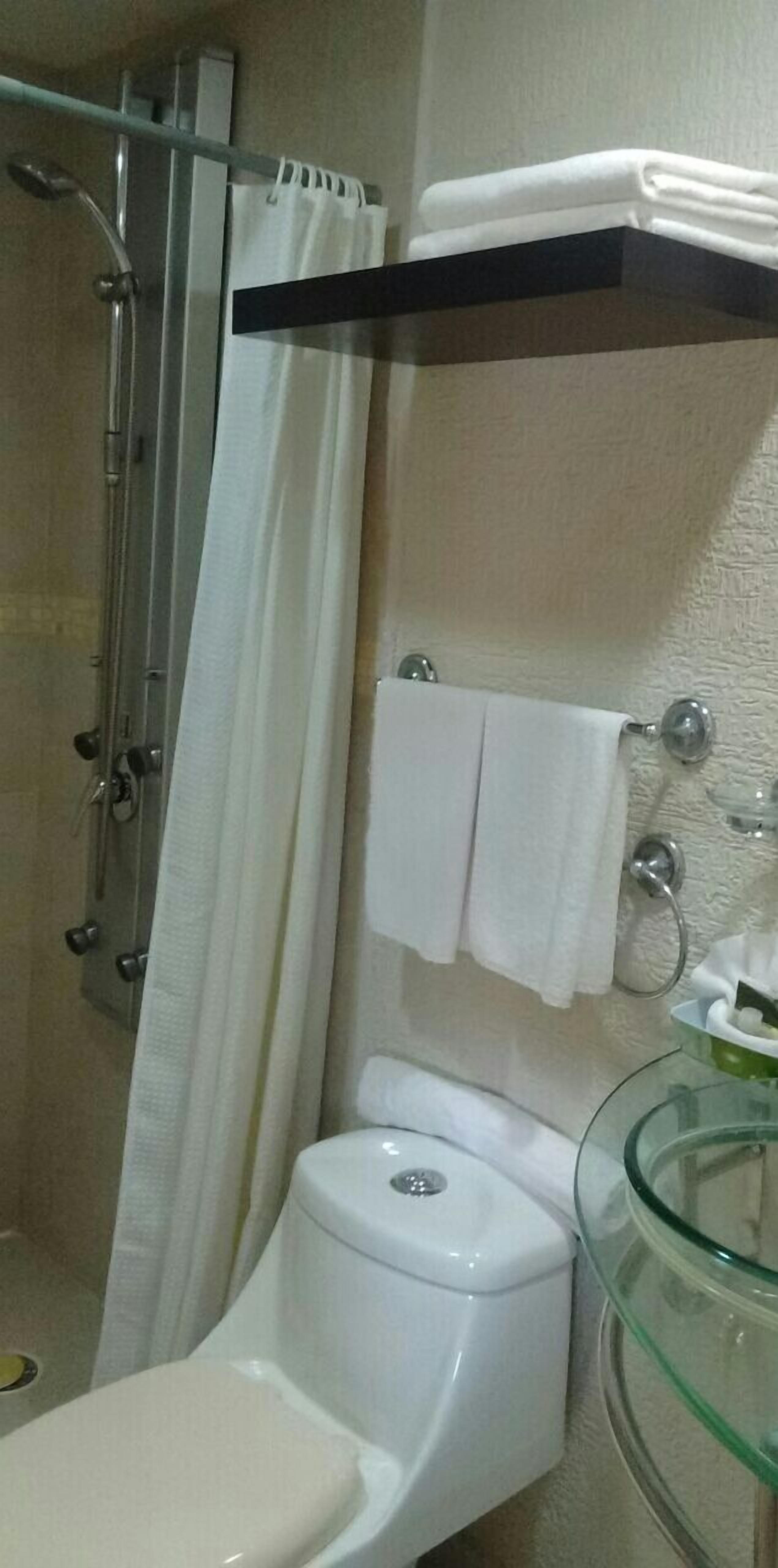 double room, 2 double beds | bathroom | shower, free toiletries, hair dryer, towels