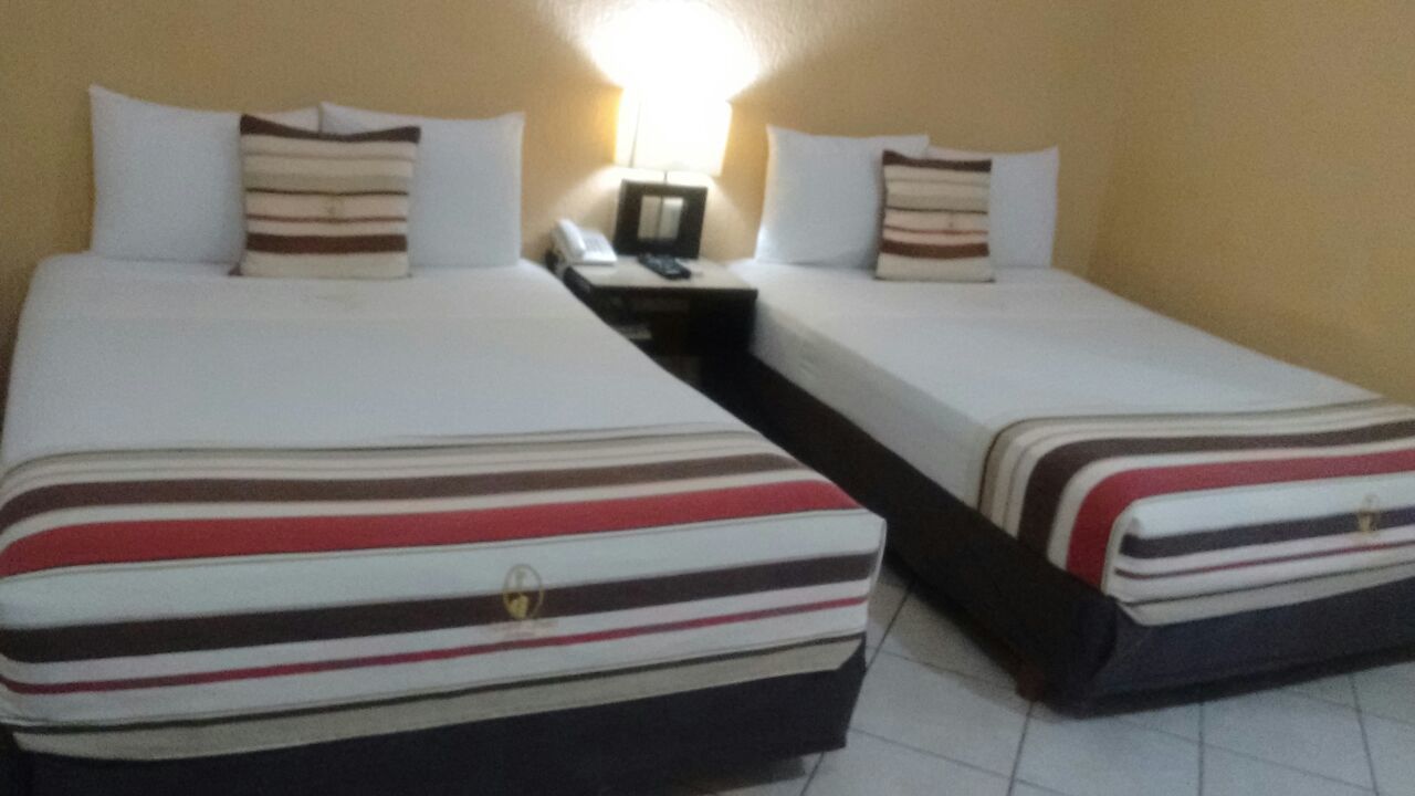 double room, 2 double beds | premium bedding, desk, iron/ironing board, rollaway beds